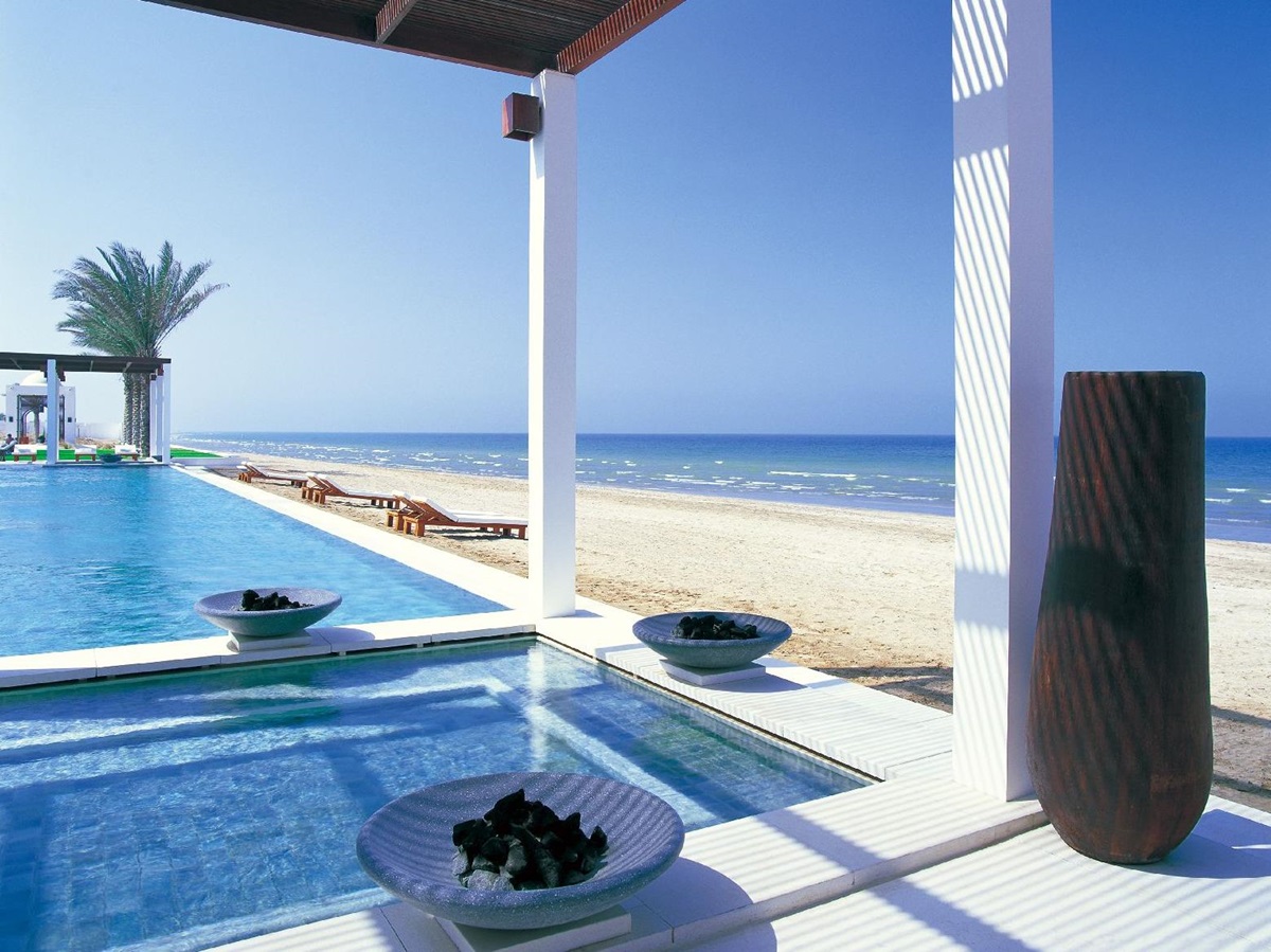 Swimming pool and beach at the Chedi Muscat in Oman