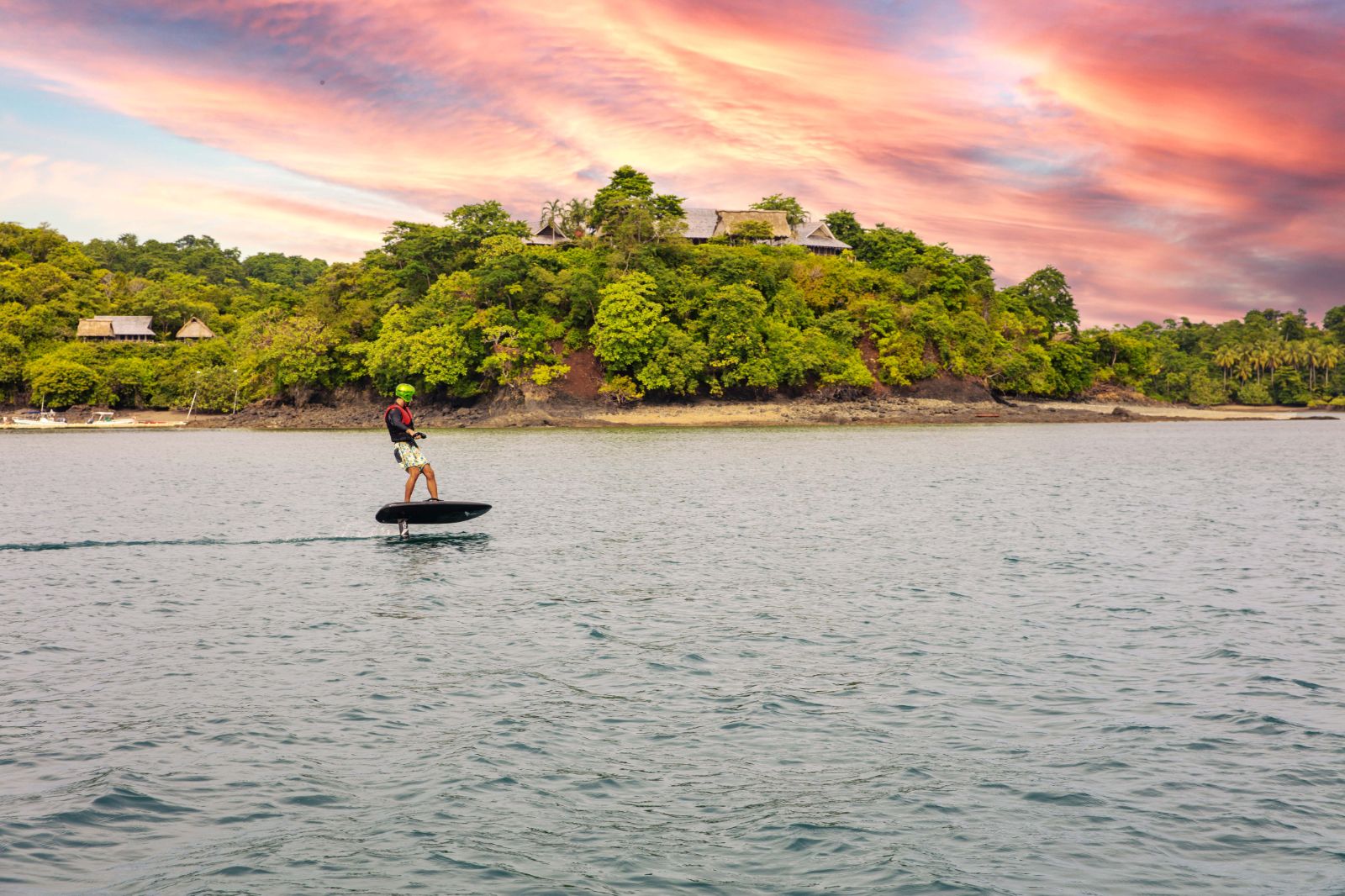 Man on a hydrofoil at sunset at Islas Secas Panama