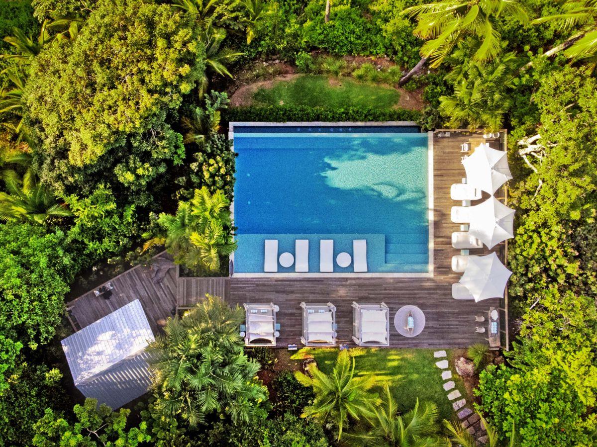 Aerial view of a guest villa pool at Islas Secas resort in Panama