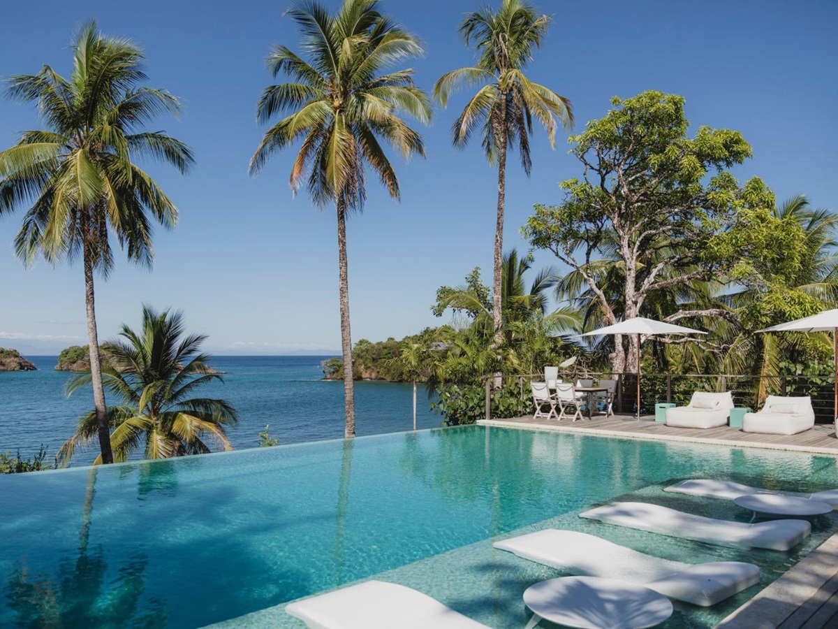 Poolside with ocean view at Islas Secas resort in Panama