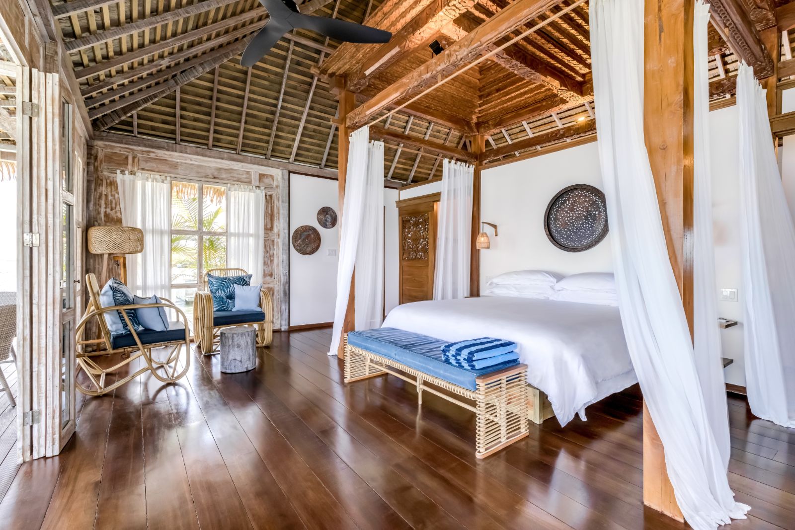 Guest suite bedroom at Nayara Bocas Del Toro resort in Panama