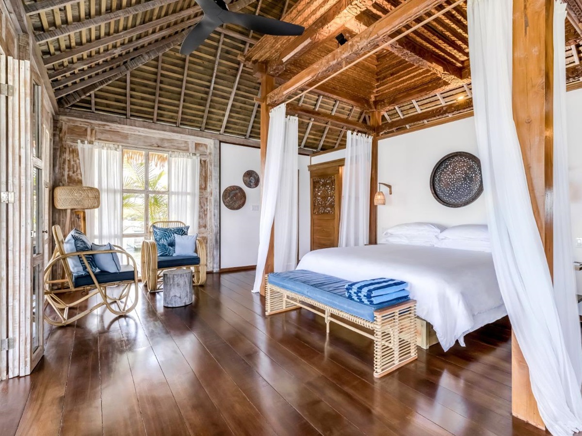 Guest suite bedroom at Nayara Bocas Del Toro resort in Panama