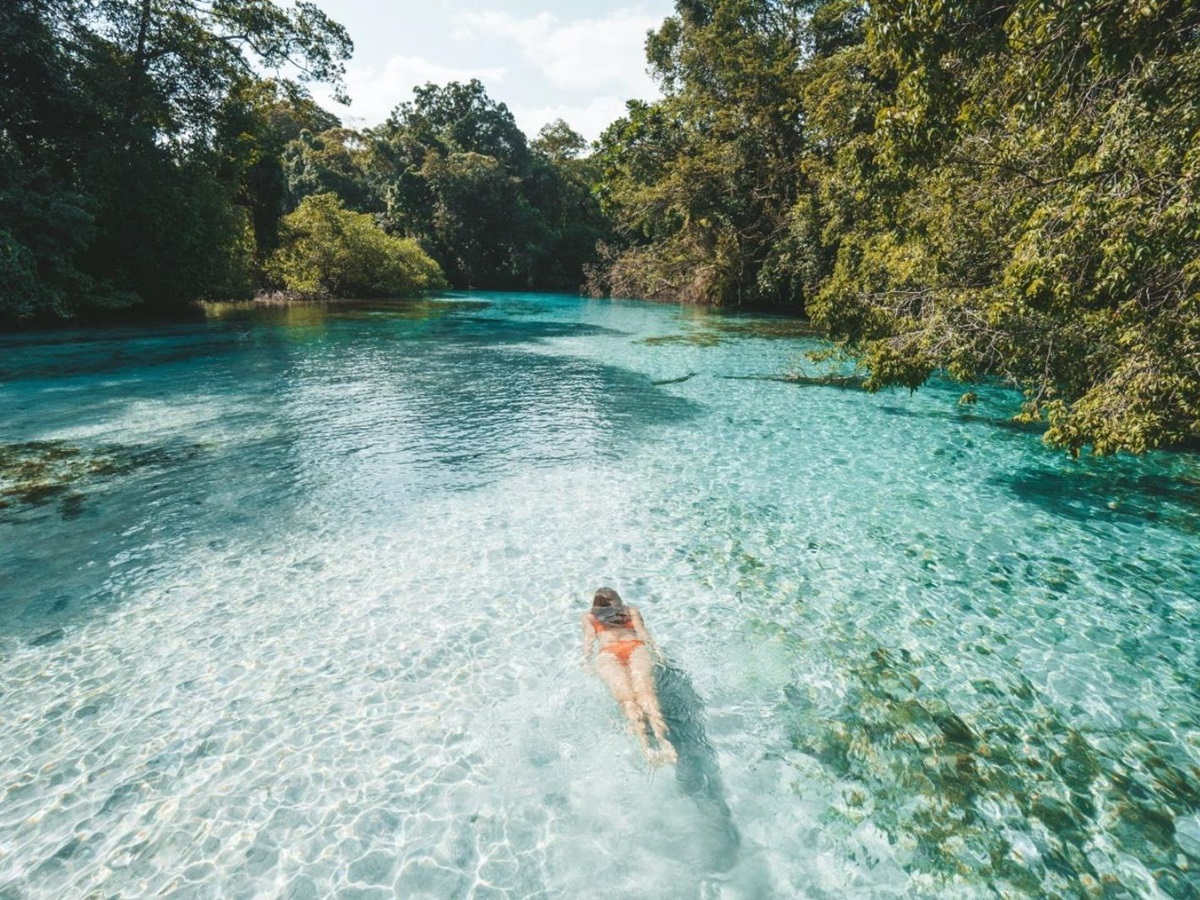 Swimming in the sea on the grounds of Nayara Bocas Del Toro resort in Panama
