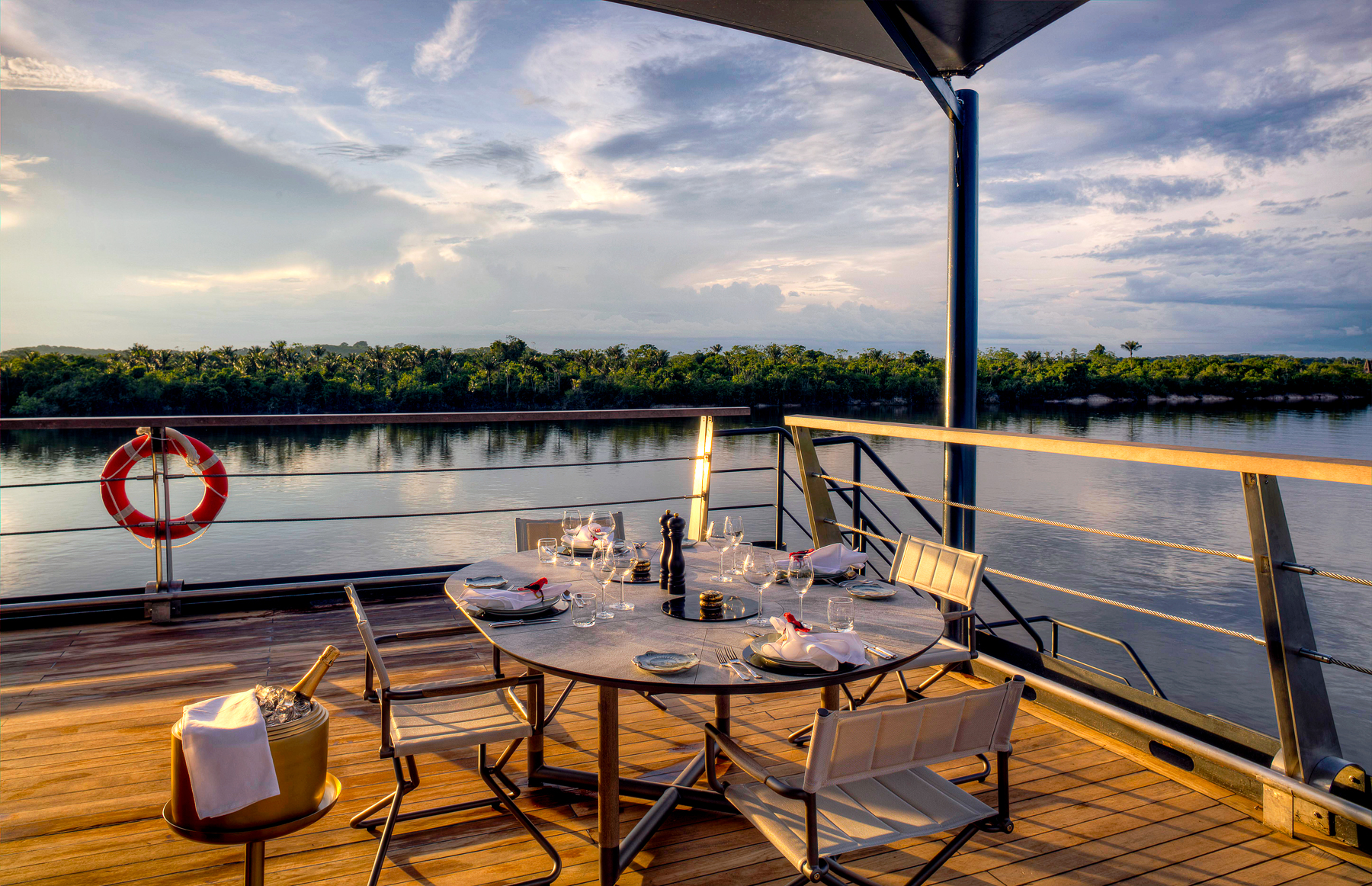 Alfresco dining on the deck of the Aqua Nera river cruiser on the Peruvian Amazon