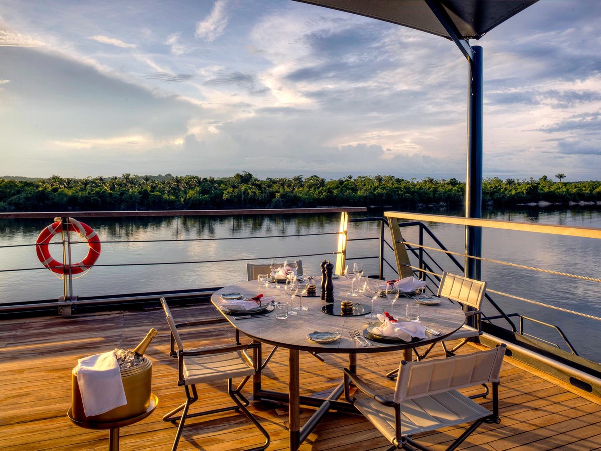 Alfresco dining on the deck of the Aqua Nera river cruiser on the Peruvian Amazon