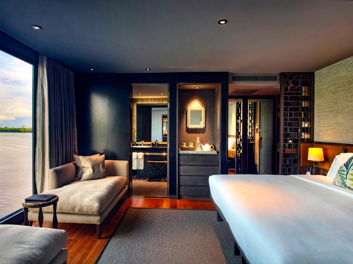 A guest suite with views of the Amazon onboard the Aqua Nera river cruiser in Peru