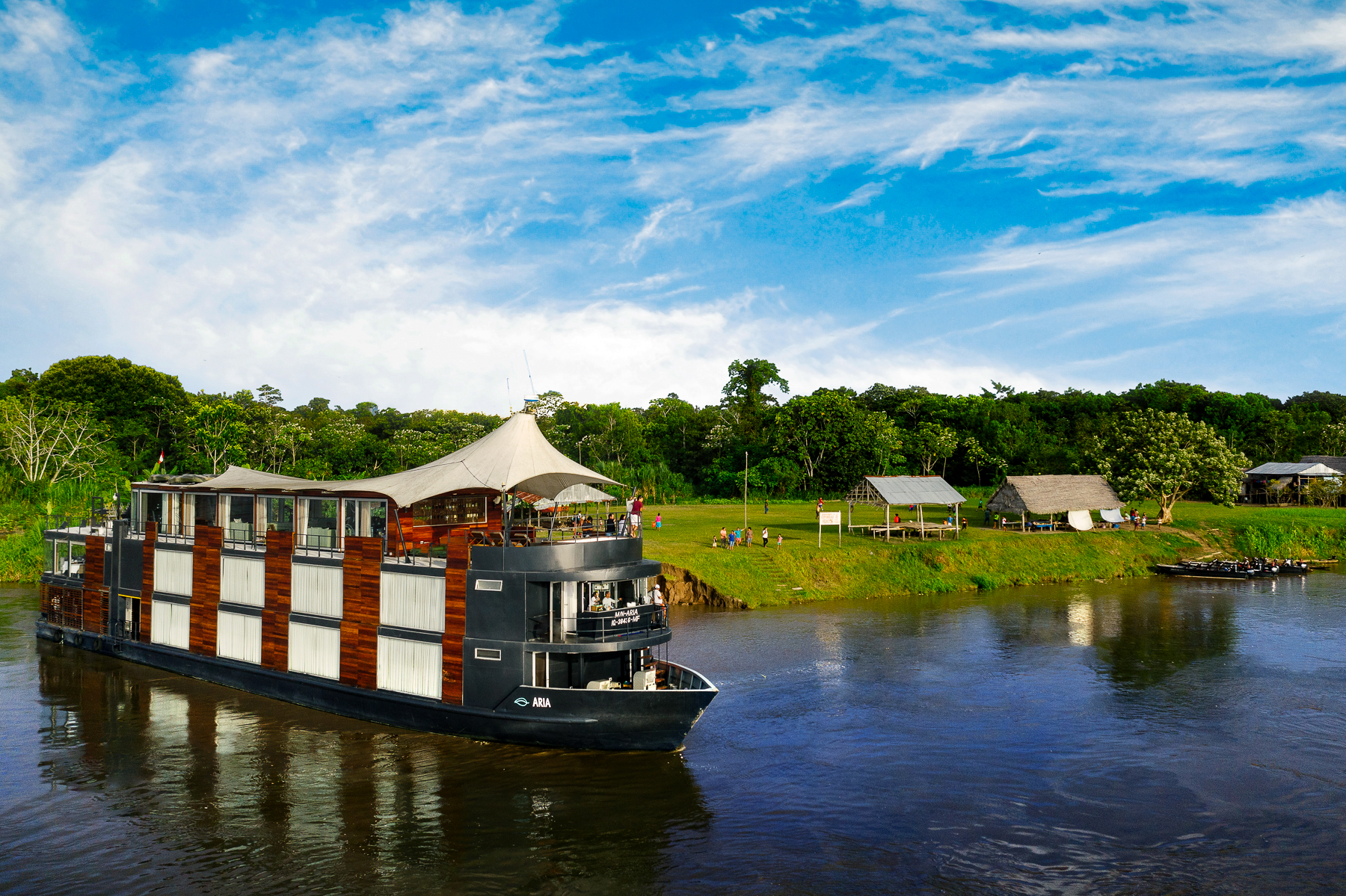The Aria Amazon luxury river cruiser moored on the banks of the Peruvian Amazon