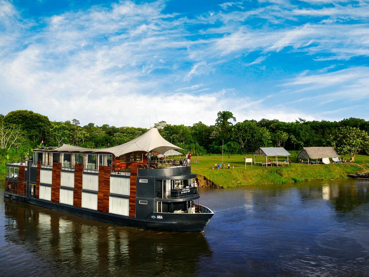 The Aria Amazon luxury river cruiser moored on the banks of the Peruvian Amazon