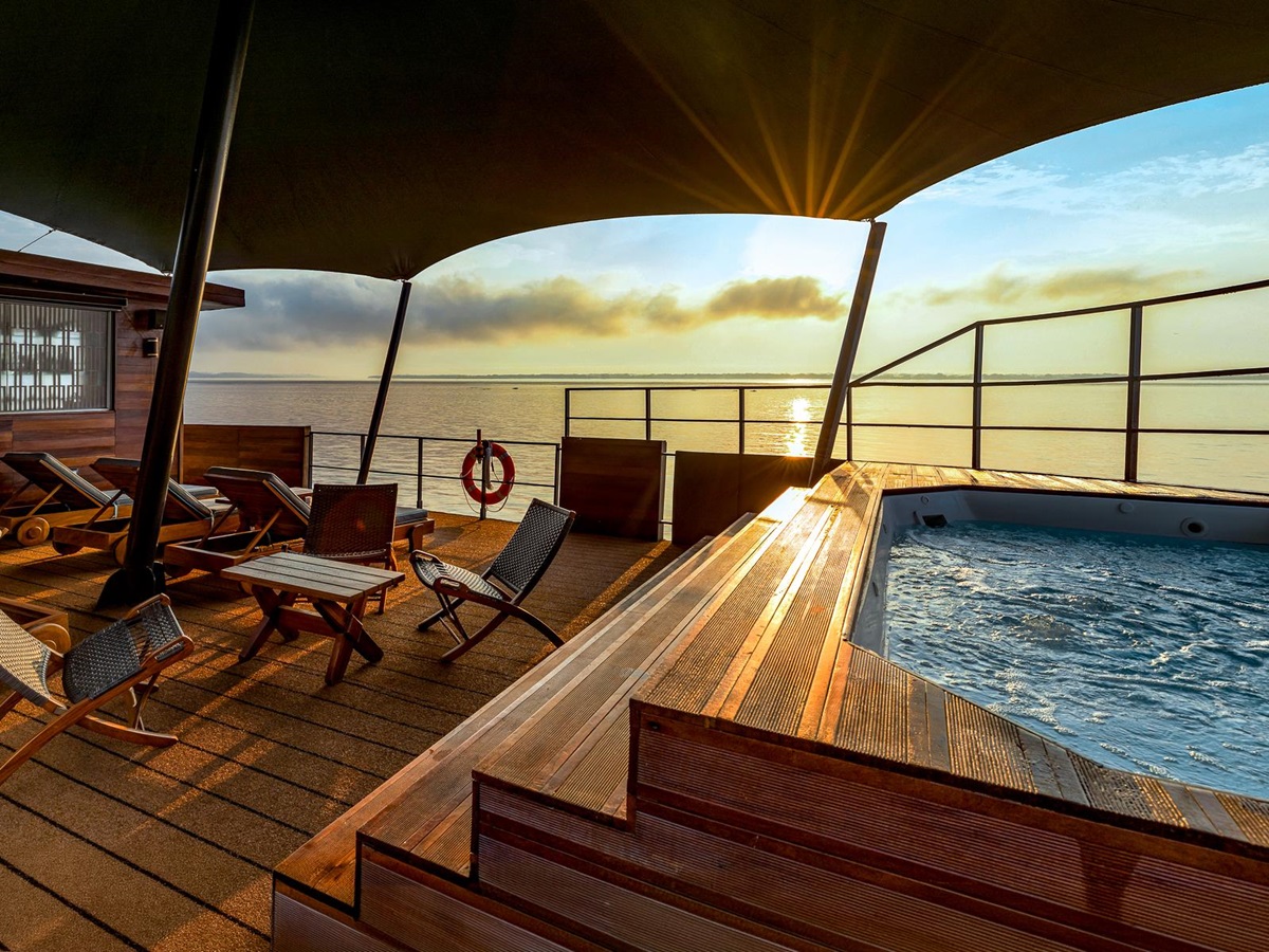 Jacuzzi in the outdoor lounge onboard the Aria Amazon luxury river cruiser in Peru
