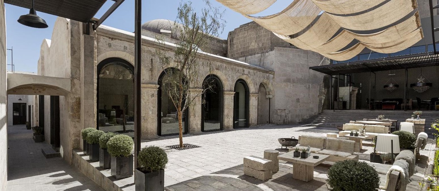 Courtyard with outdoor seating at Cirqa hotel in Arequipa Peru