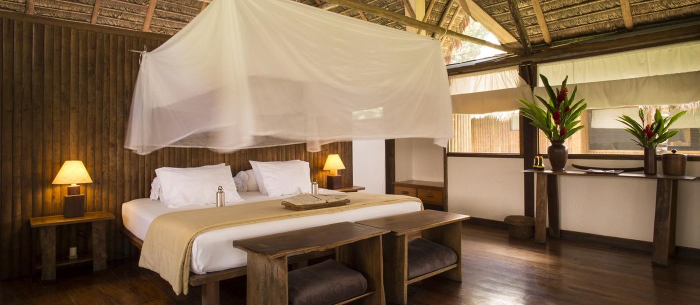 Bedroom area of the Amazonica Suite at Inkaterra Reserva Amazonica in Peru