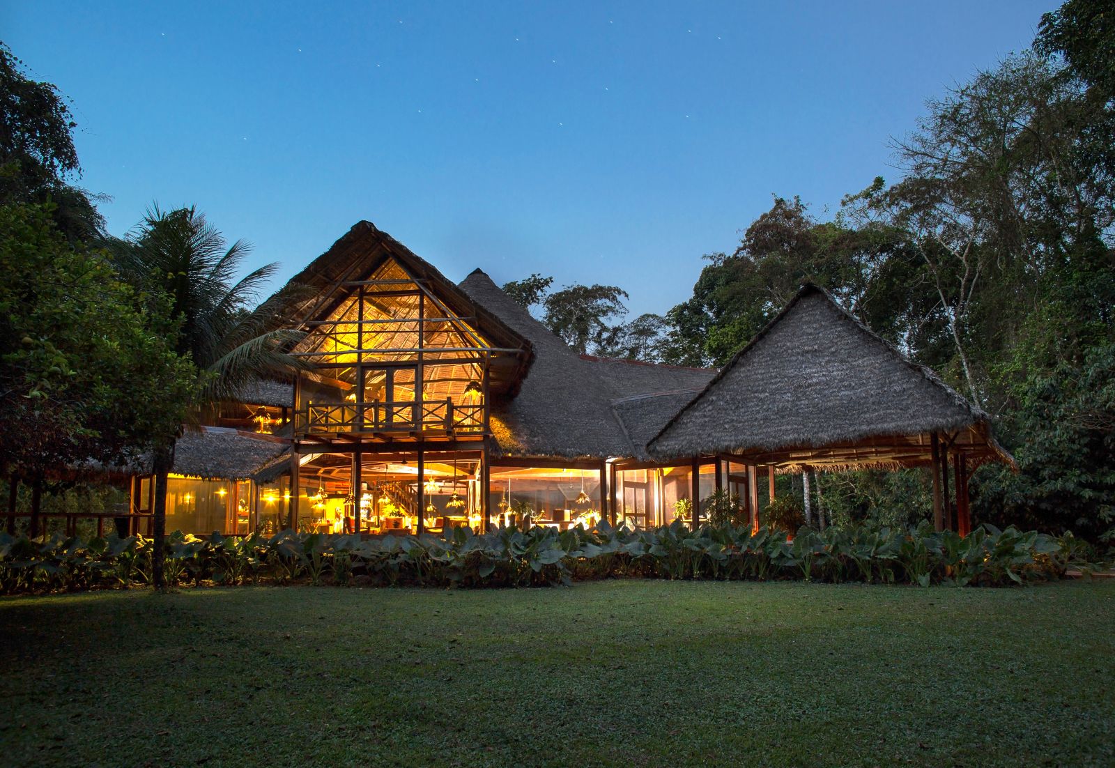 Exterior view of the main lodge building at Inkaterra Reserva Amazonica in Peru