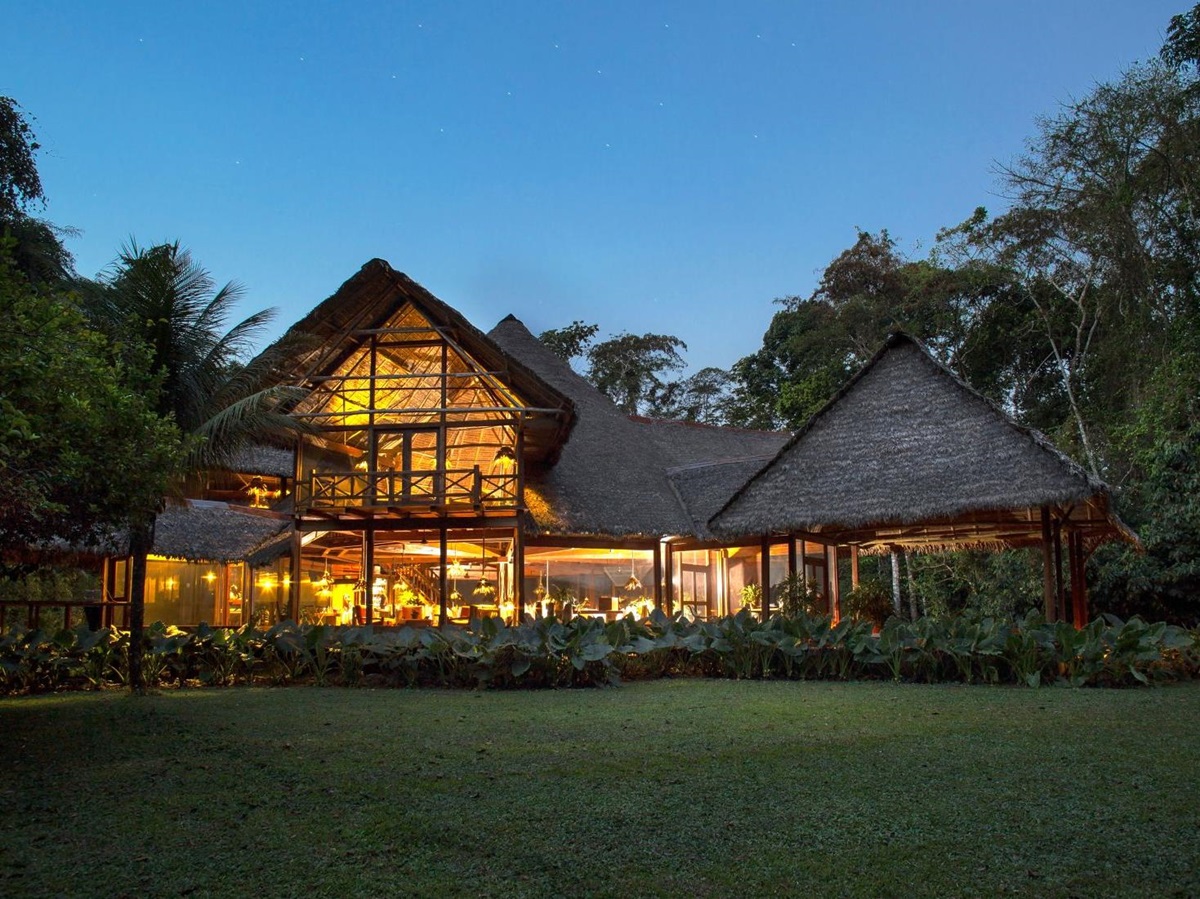 Exterior view of the main lodge building at Inkaterra Reserva Amazonica in Peru