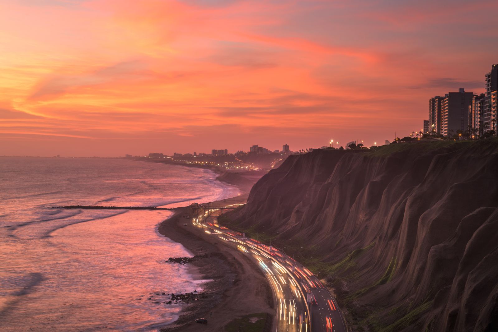 Sunset over the cliffs and Pacific Ocean in the Miraflores district of Lima in Peru