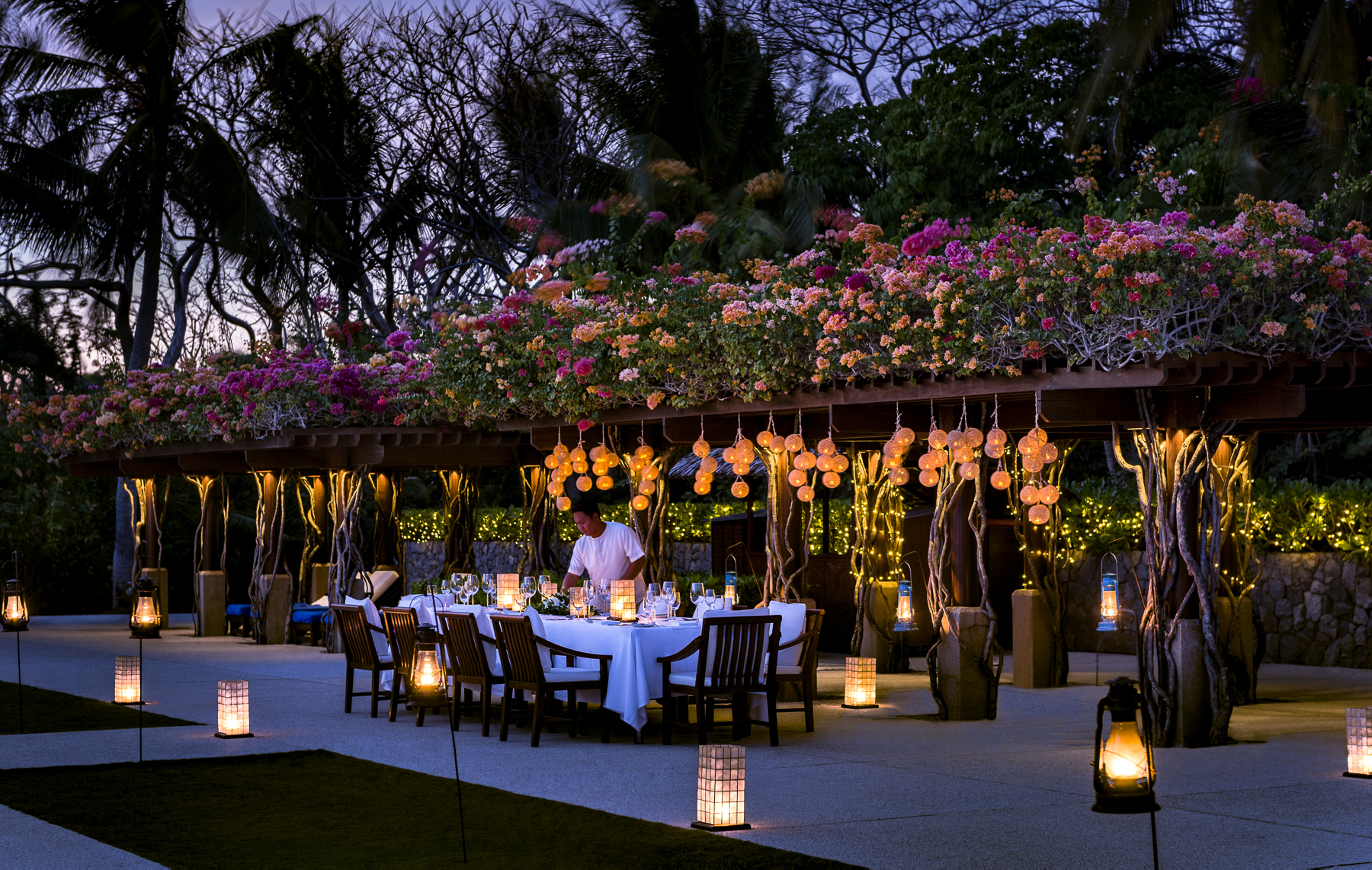 Alfresco dining at the Clubhouse Restaurant at Amanpulo luxury beach resort in the Philippines