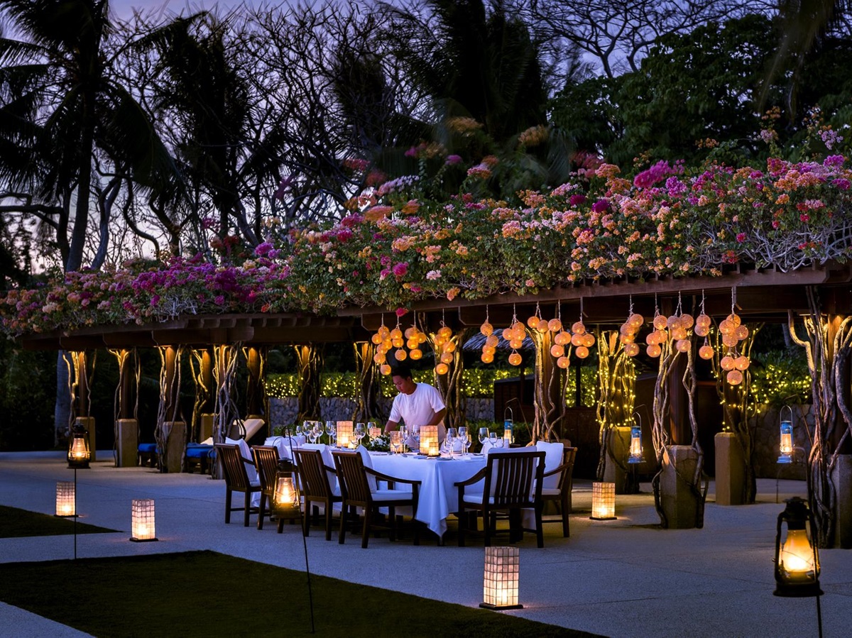 Alfresco dining at the Clubhouse Restaurant at Amanpulo luxury beach resort in the Philippines