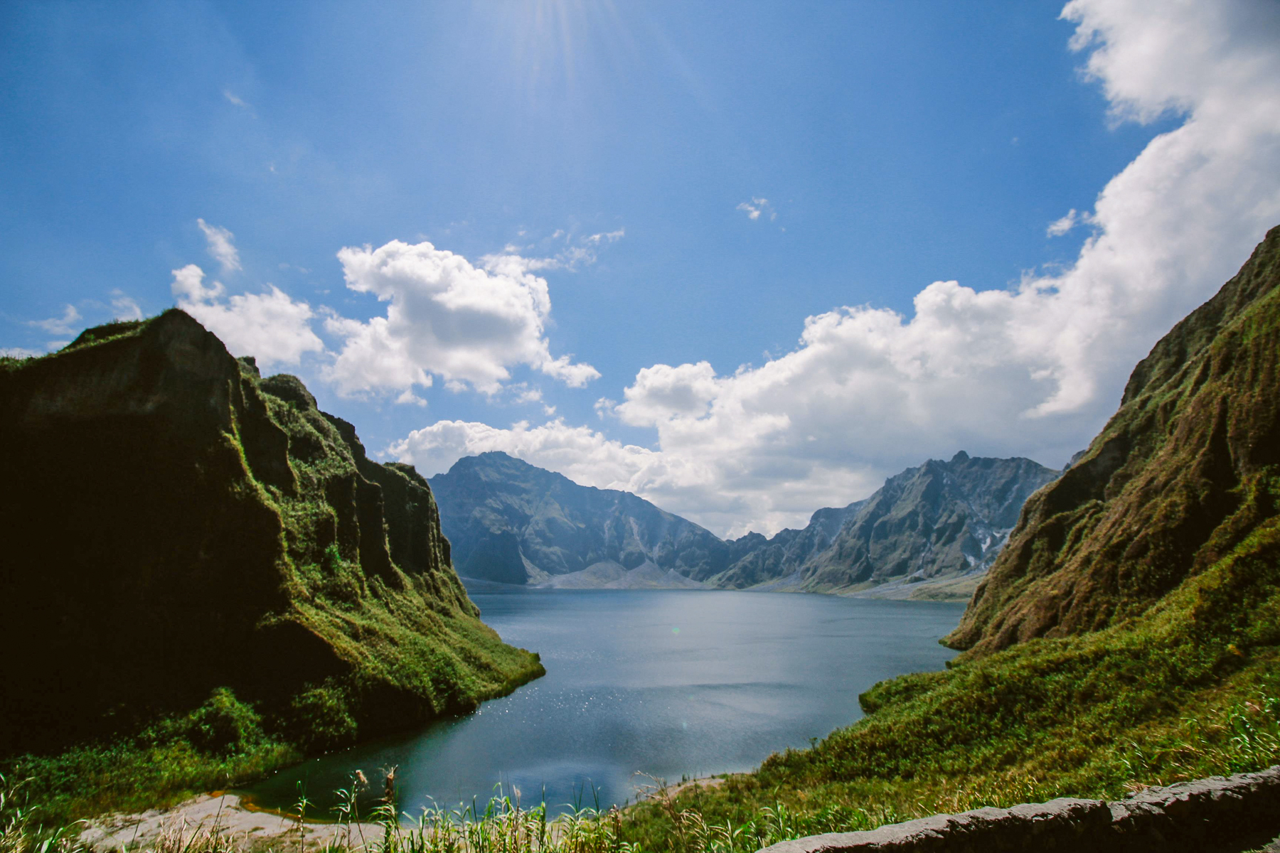 View across the lake and peaks of Mount Pinatubo in the Philippines