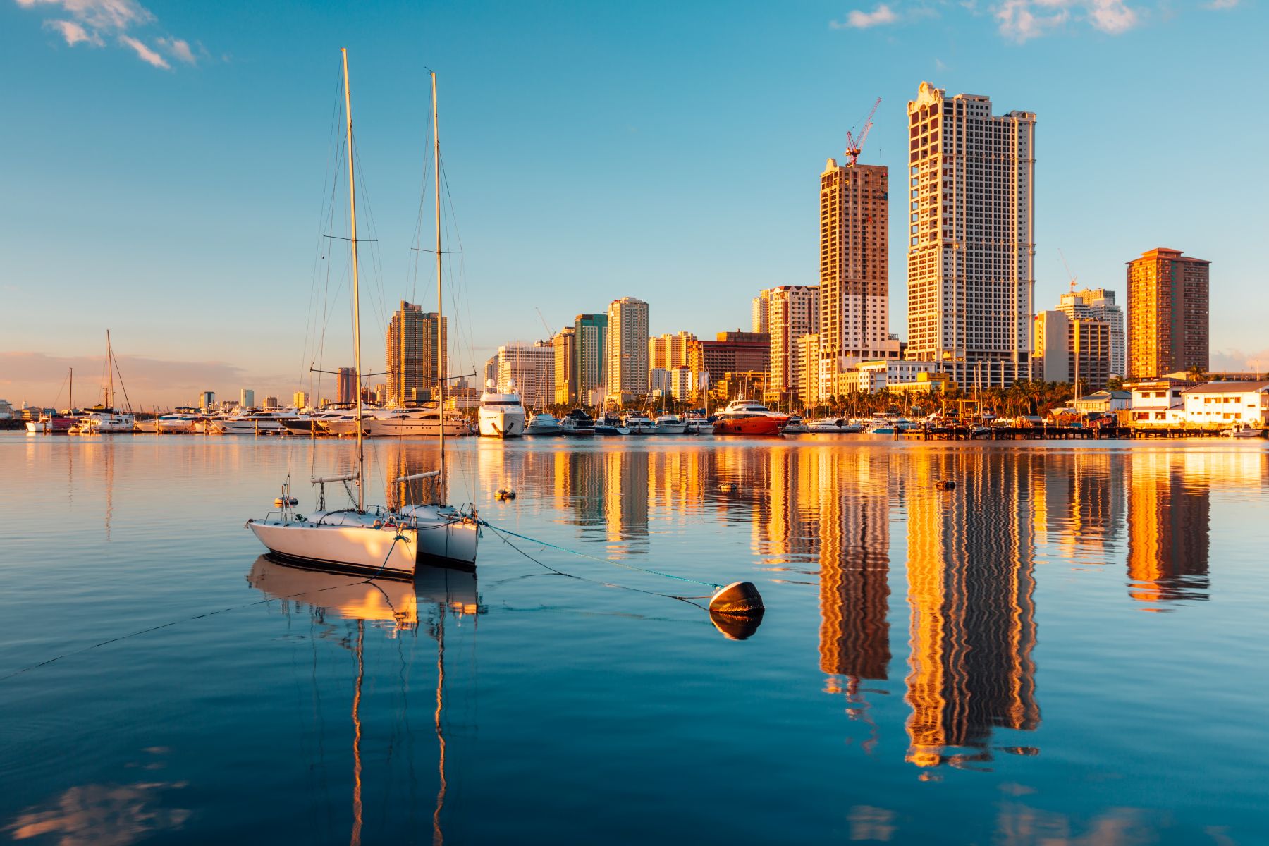 View of boats on the water in Manila