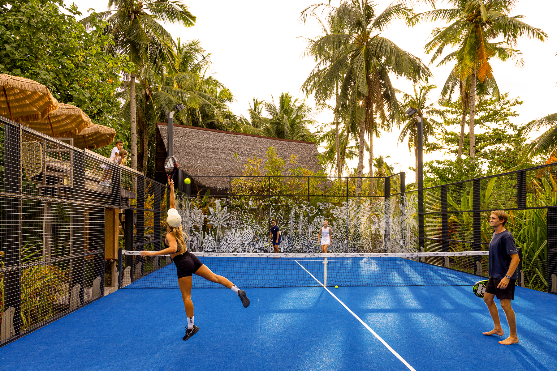 Playing tennis at Nay Palad Hideaway in the Philippines