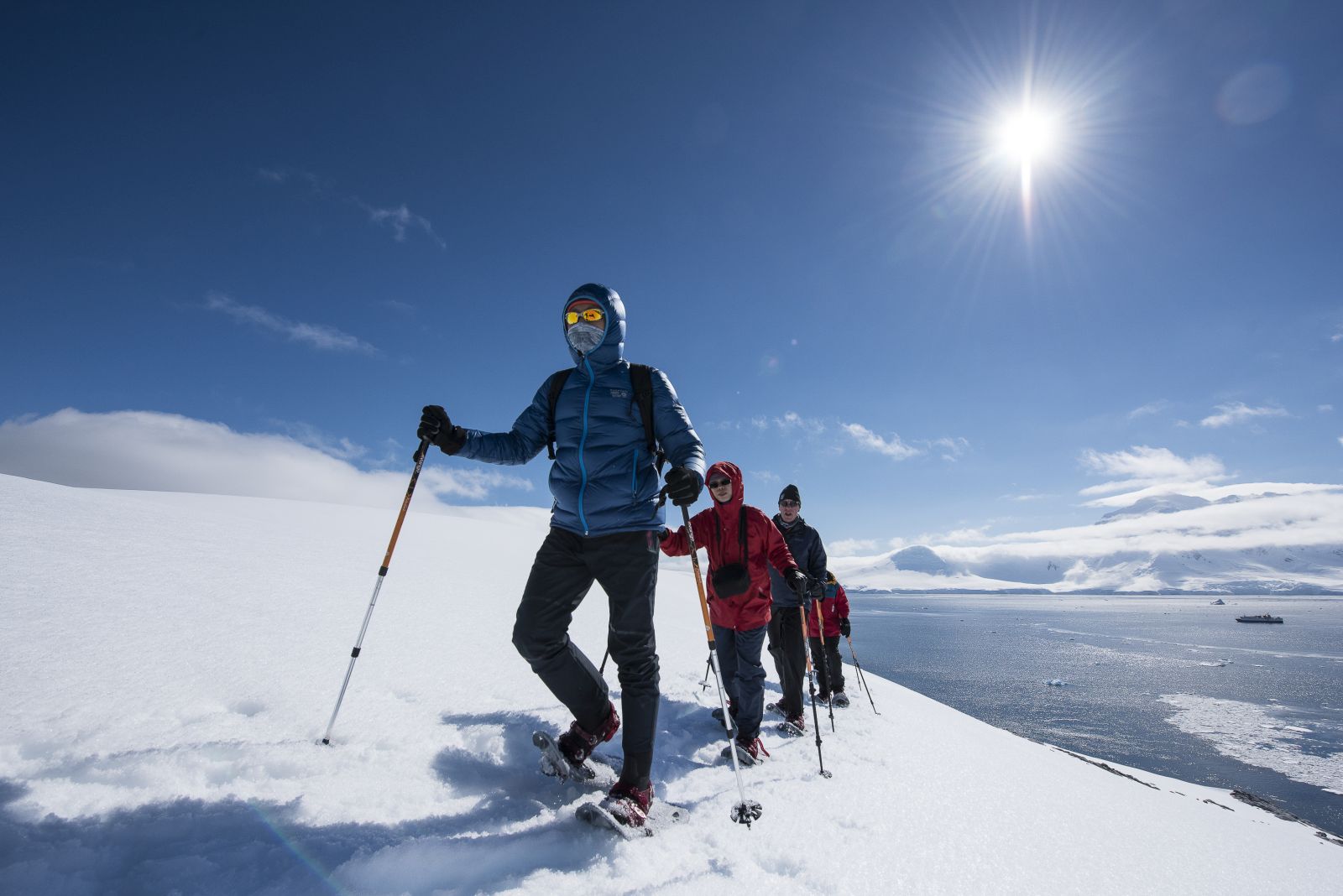 Guests snowshoeing as part of their Antartica 21 cruise programme