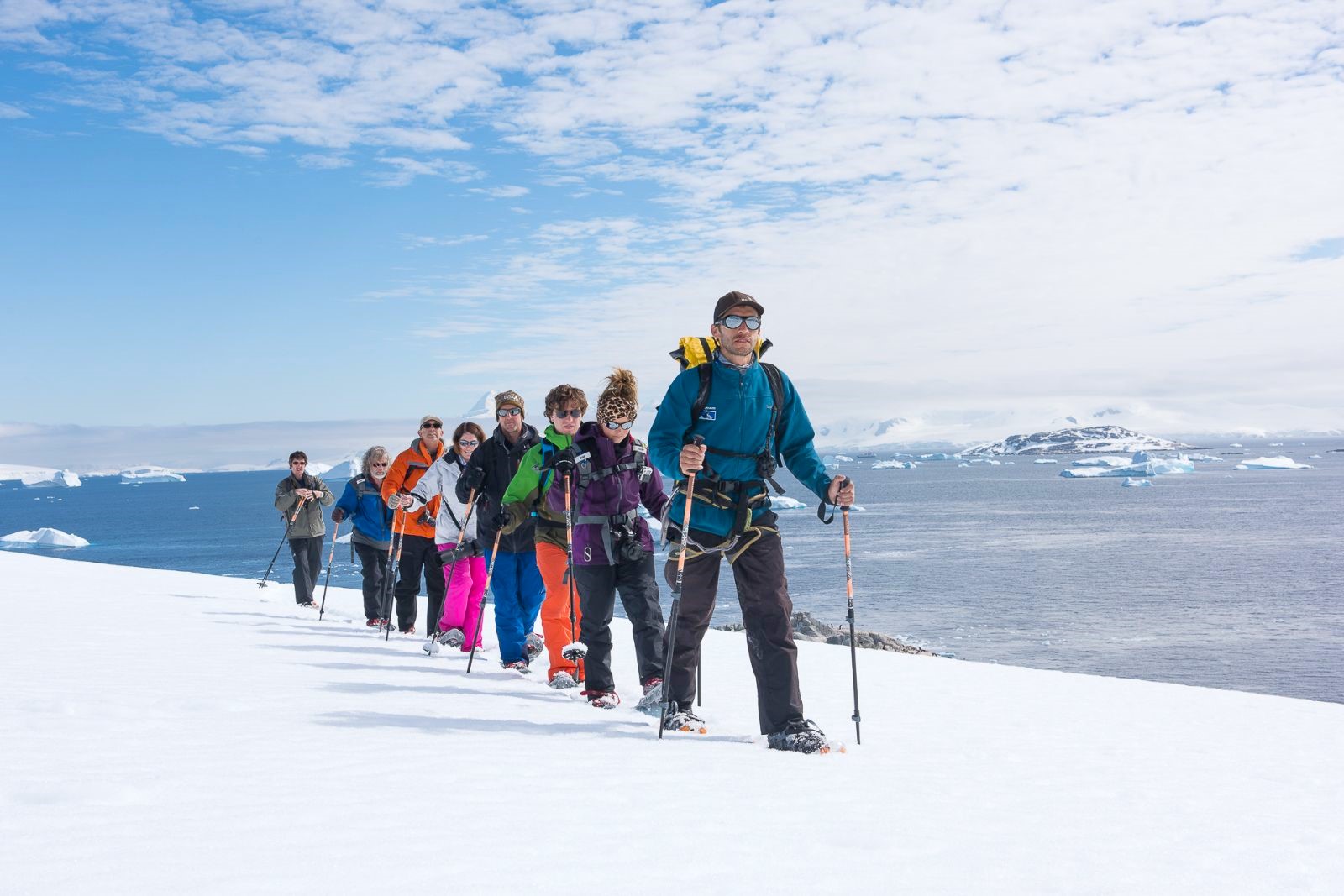 A group from the Magellan Explorer trekking in Antarctica