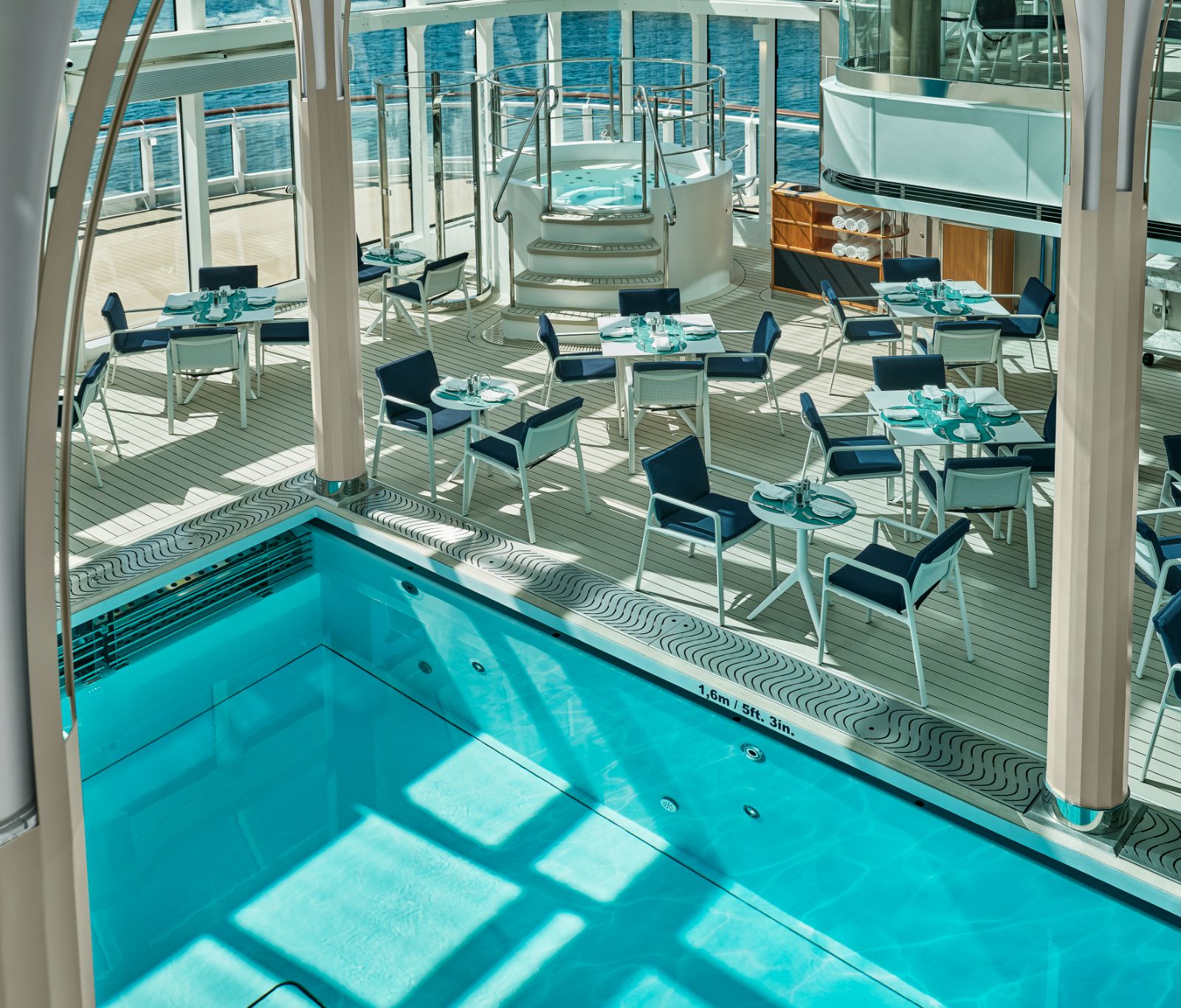 Swimming pool in the glass ceilinged deck on board the Silver Endeavour