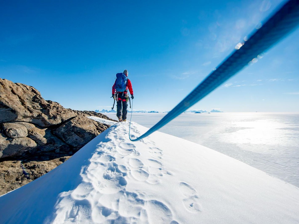 Ropewalking along a mountain in Antarctica near Whichaway camp by White Desert