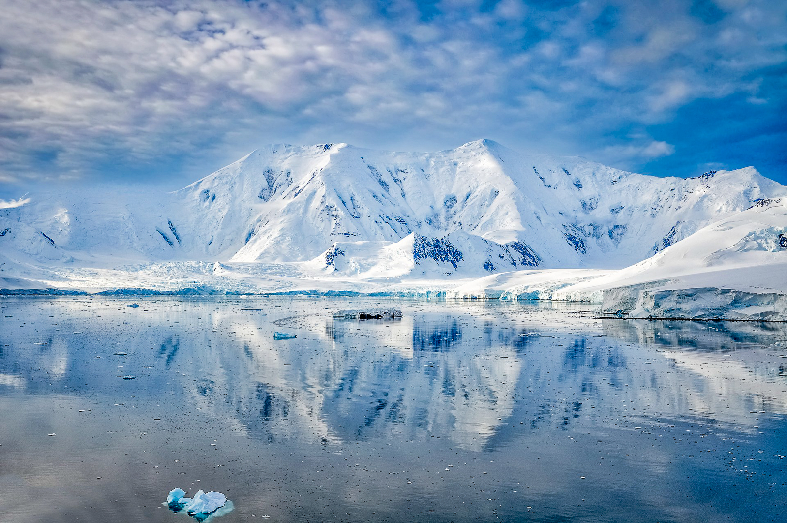 A scenic photograph of an Antarctic mountain range