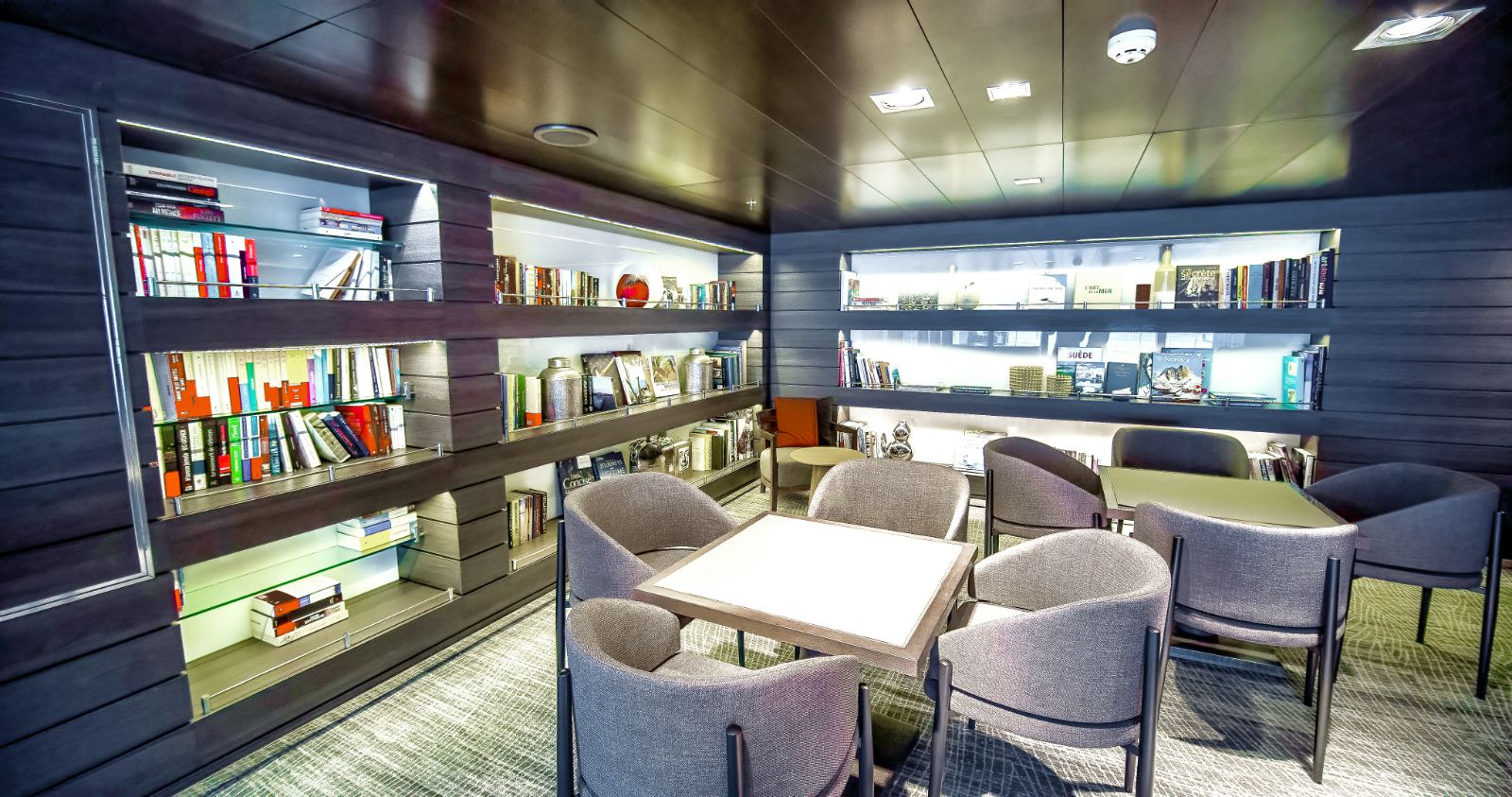 Library onboard Ponant's Le Boreal cruise ship in the Arctic