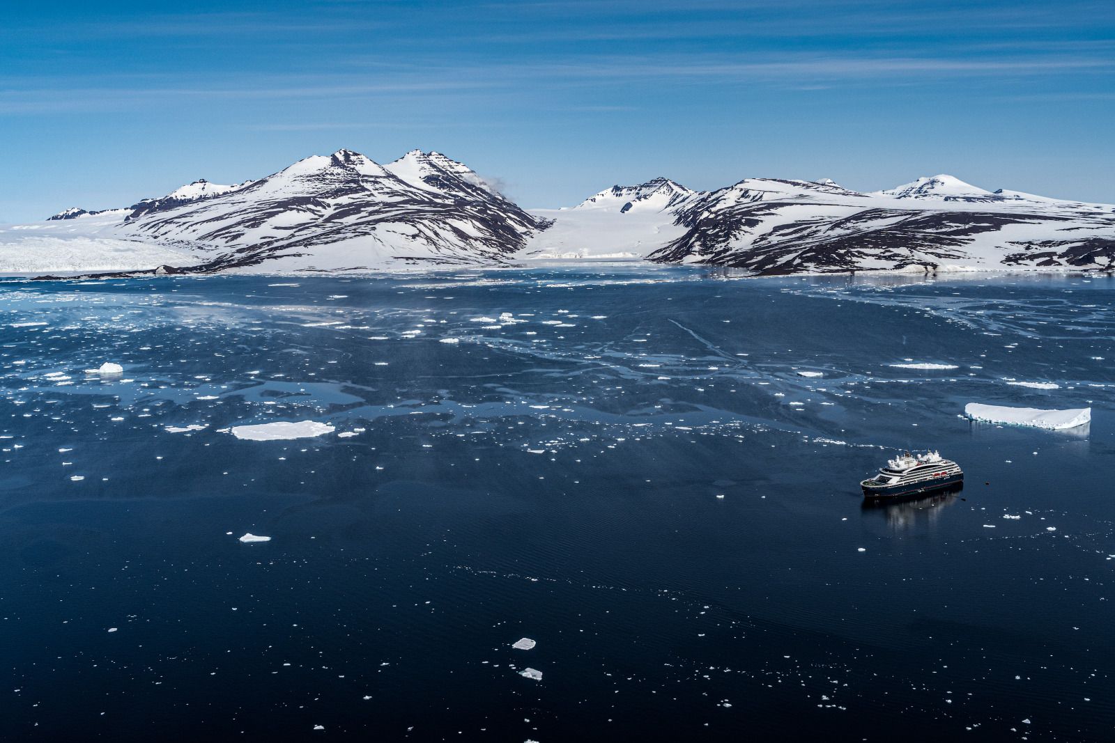 Aerial view of Le Commandant Charcot cruise ship in the Arctic