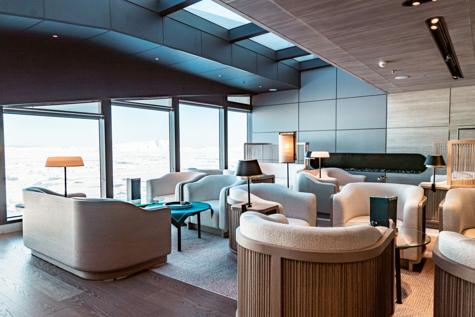 Guest lounge onboard Ponant's Le Commandant Charcot cruise ship in the Arctic