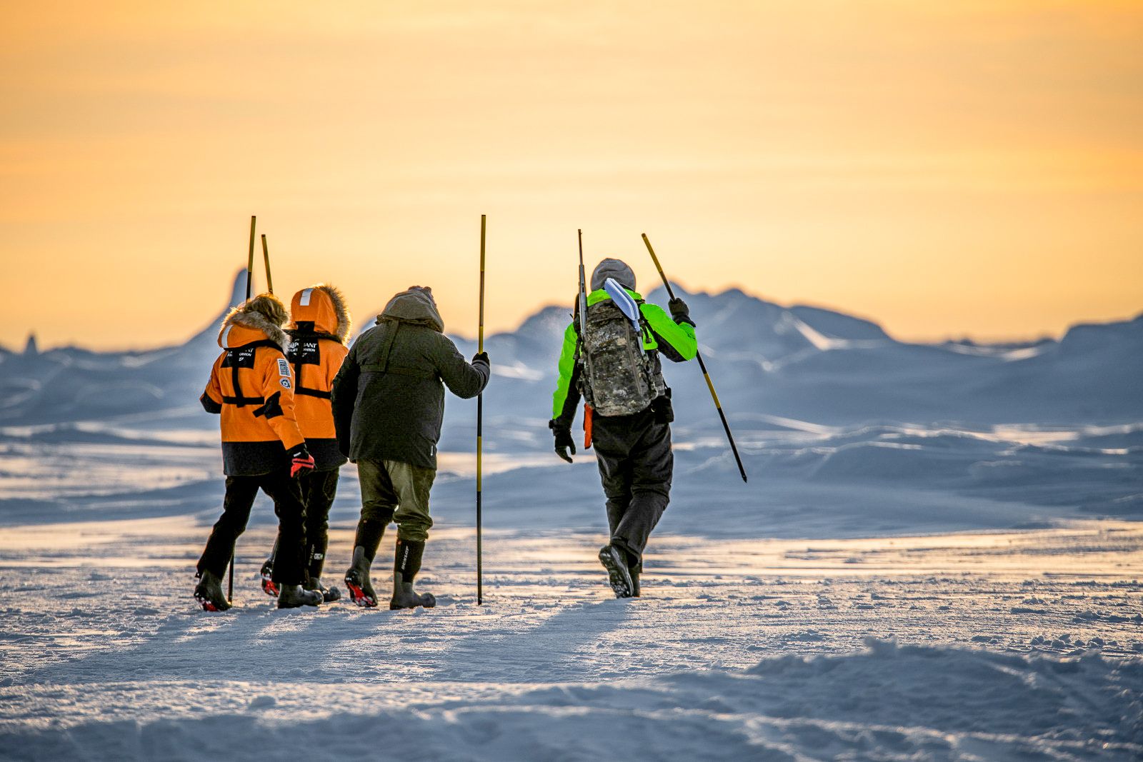 Trekking over the ice from Ponant's Le Lyrial cruise ship in the Arctic