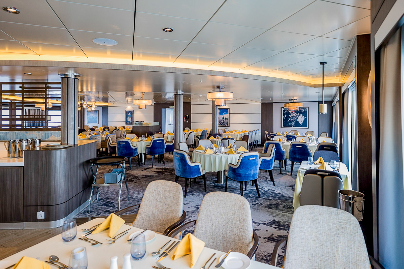 Open seating dining room onboard Aurora Expeditions' Sylvia Earle expedition cruise ship in the Arctic