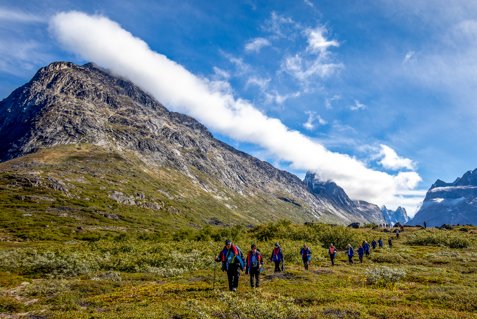 Guests of Aurora Expeditions' Sylvia Earle cruise ship trekking in the Arctic