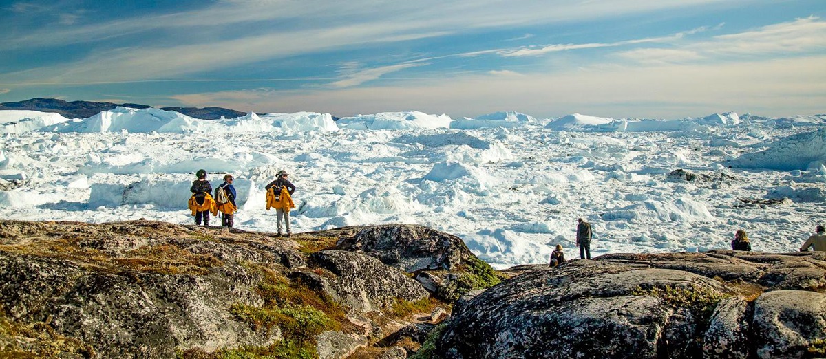 Guests of Quark Expeditions' Ultramarine viewing High Arctic scenery