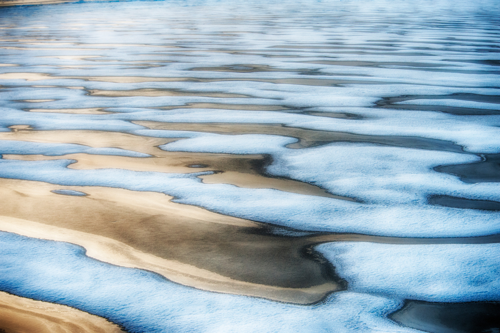 Aerial view of waves of pack ice in the Arctic ocean