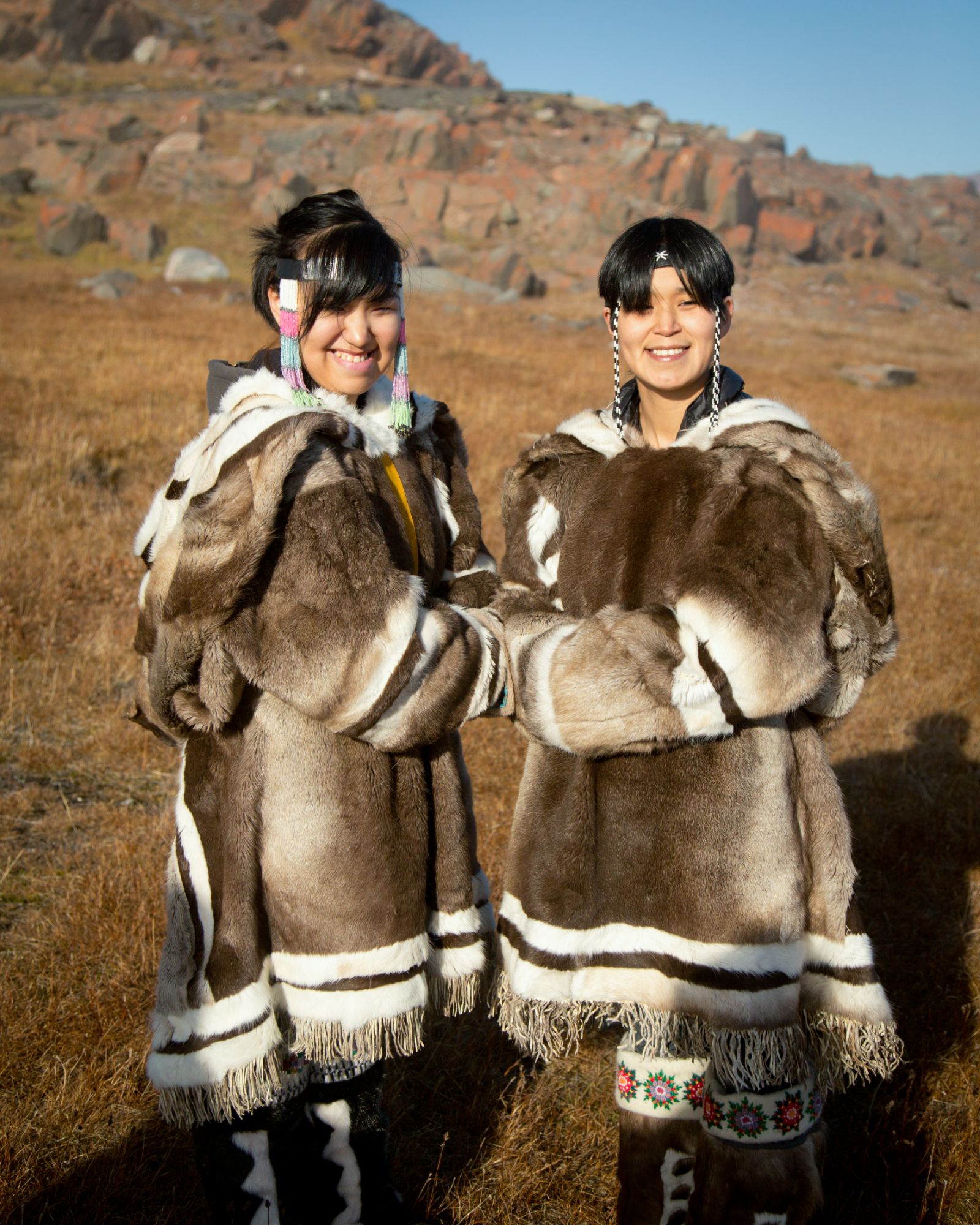 Young people in traditional Inuit dress in the Canadian Arctic