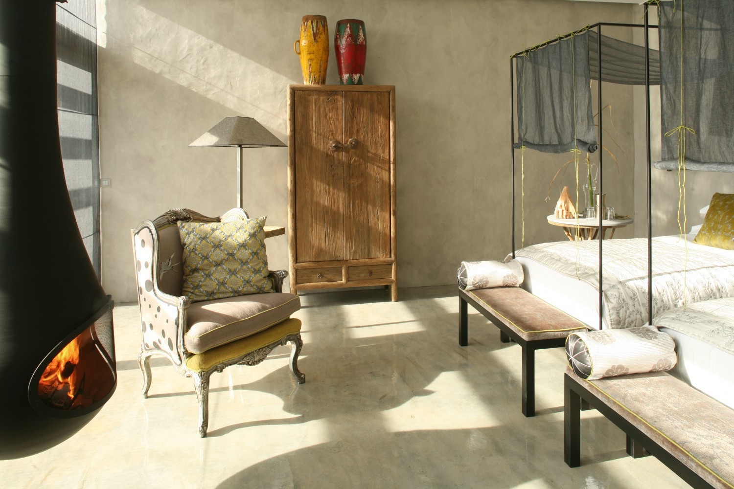 Twin room with fire and chair