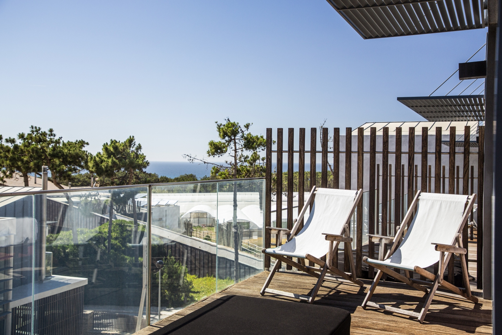 verandah with two loungers