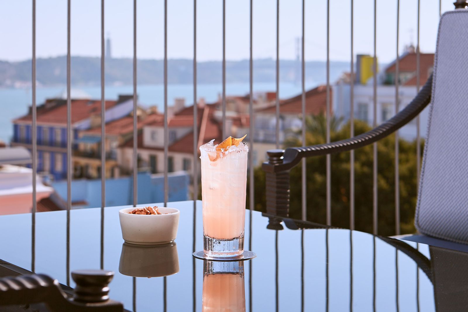 Rooftop drinks and view at the Bairro Alto Hotel in Lisbon Portugal