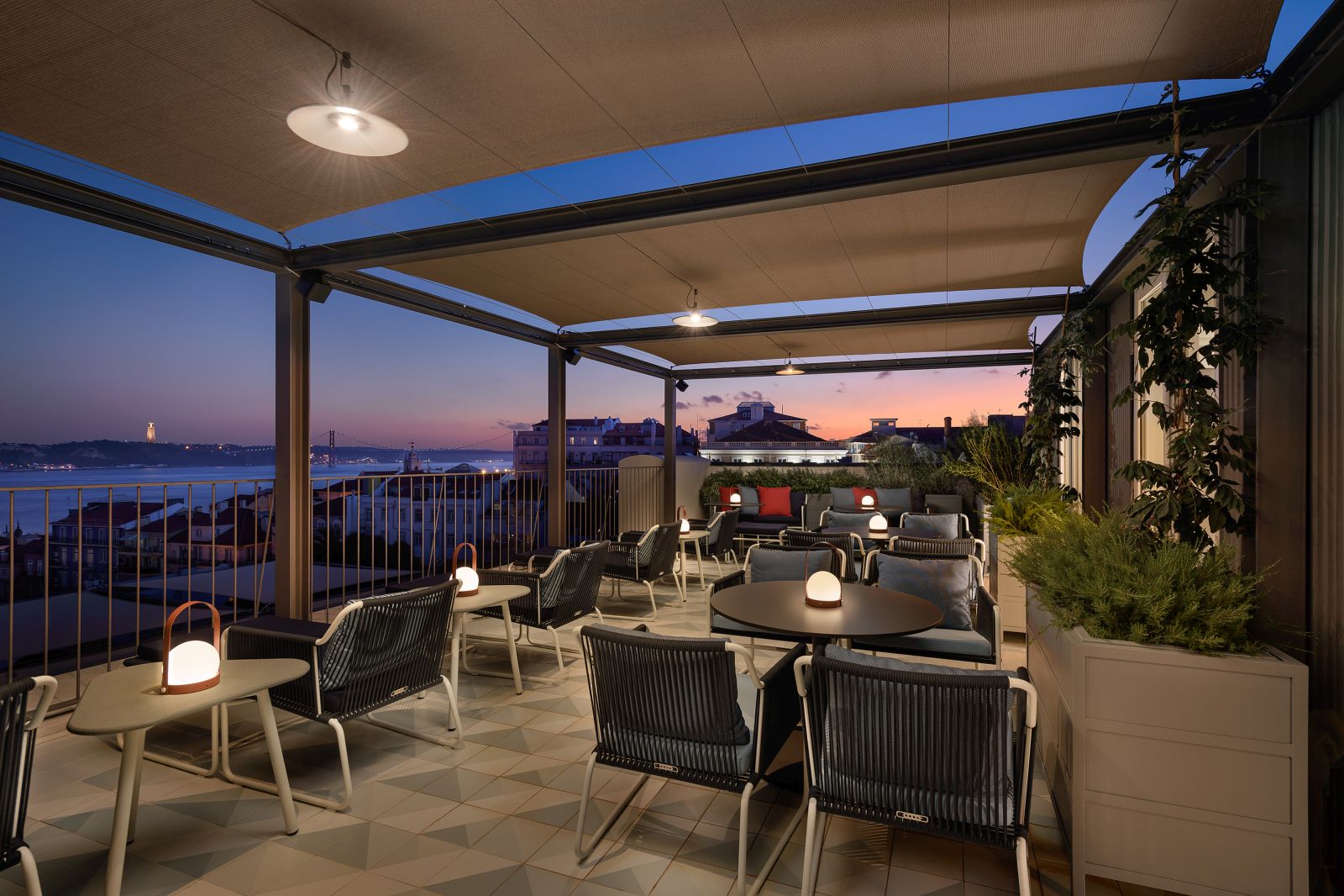 Sunset view from the roofop terrace at the Bairro Alto Hotel in Lisbon Portugal