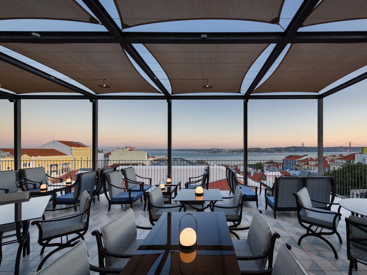 Rooftop terrace of the Bairro Alto Hotel in Lisbon at dusk