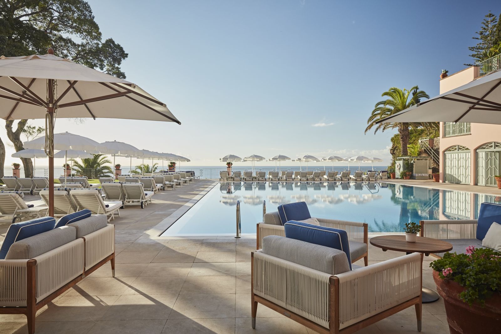 Swimming pool and terrace at Belmond Reid's Palace hotel in Madeira Portugal