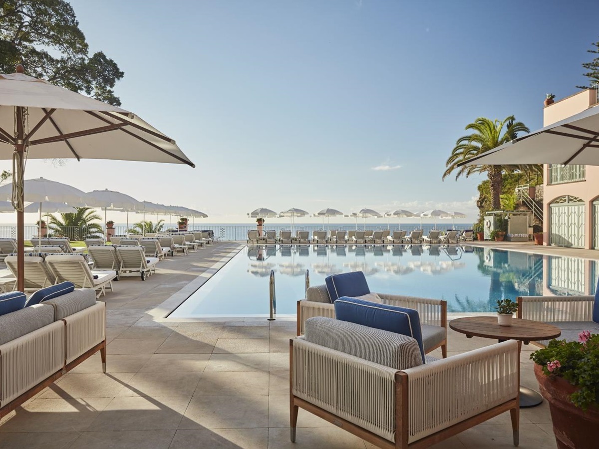 Swimming pool and terrace at Belmond Reid's Palace hotel in Madeira Portugal
