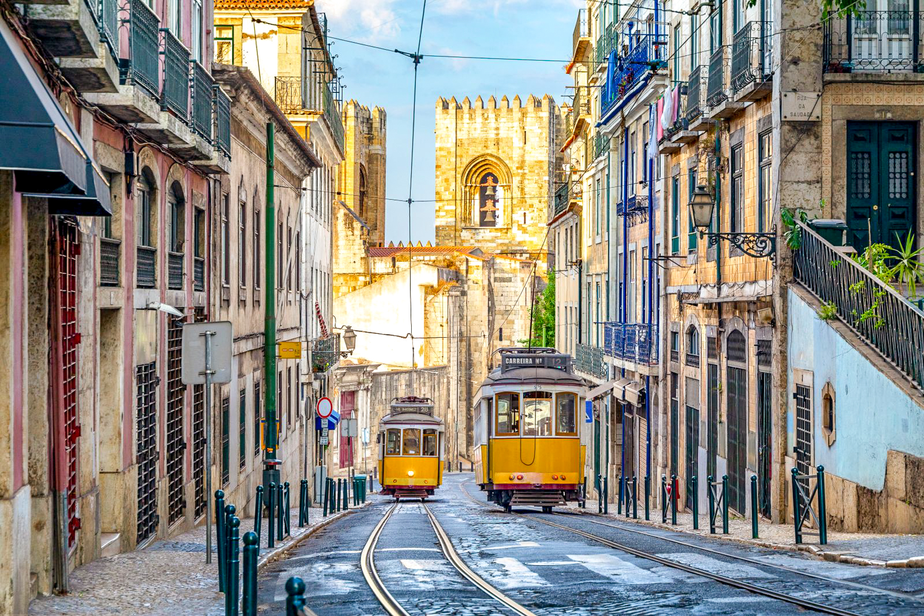 Yello trams on the streets of Lisbon