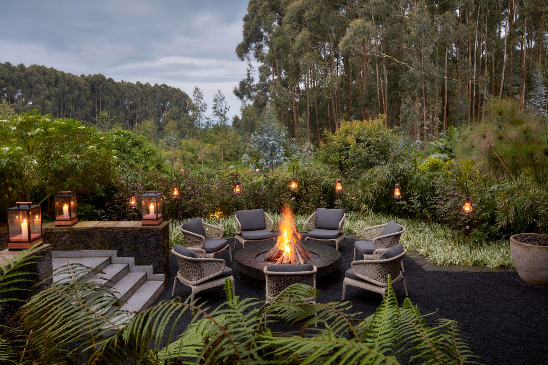 Firepit lit in the boma at One&Only Gorilla's Nest in Rwanda's Volcanoes National Park