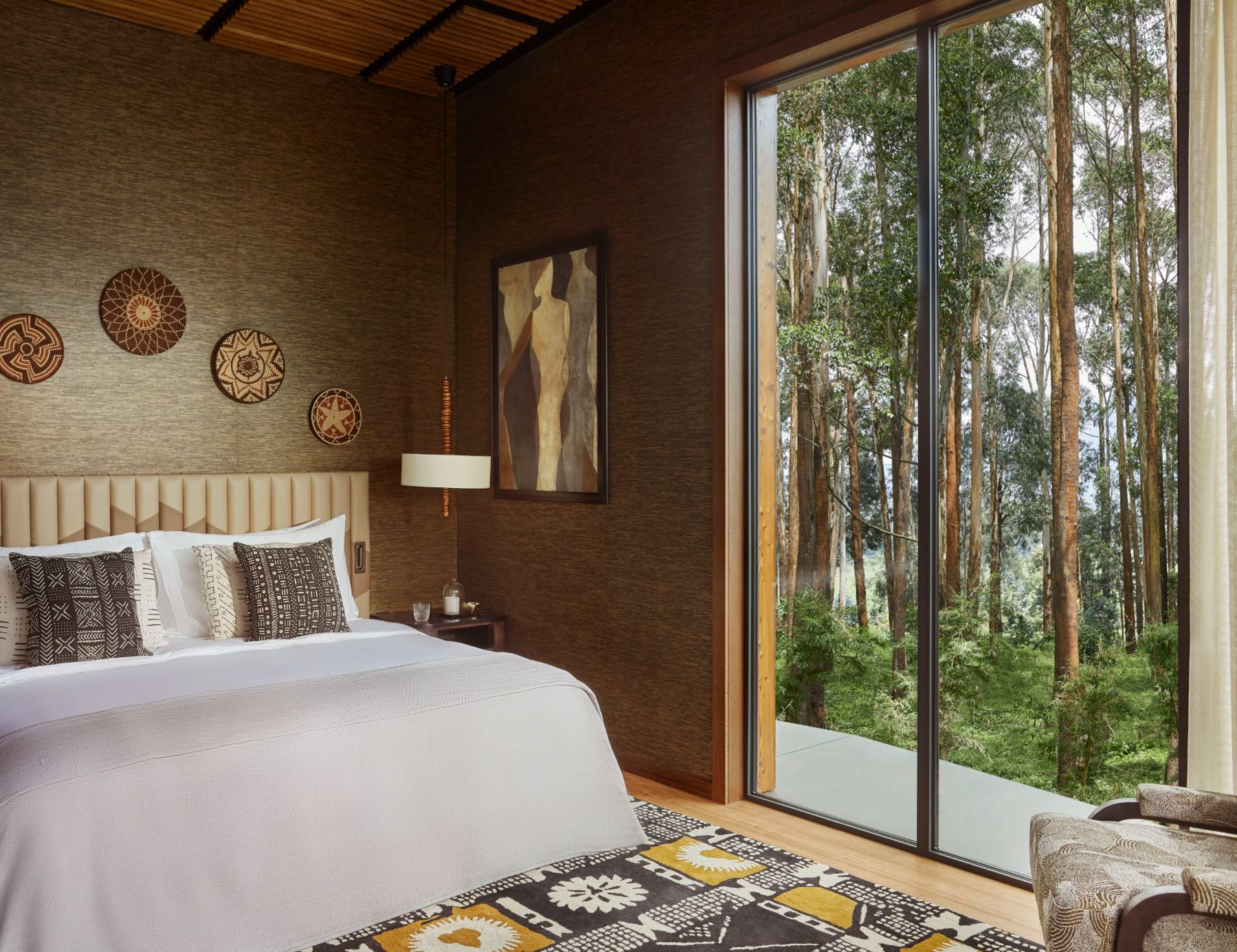 Ingagi suite bedroom at One&Only Gorilla's Nest in Rwanda's Volcanoes National Park