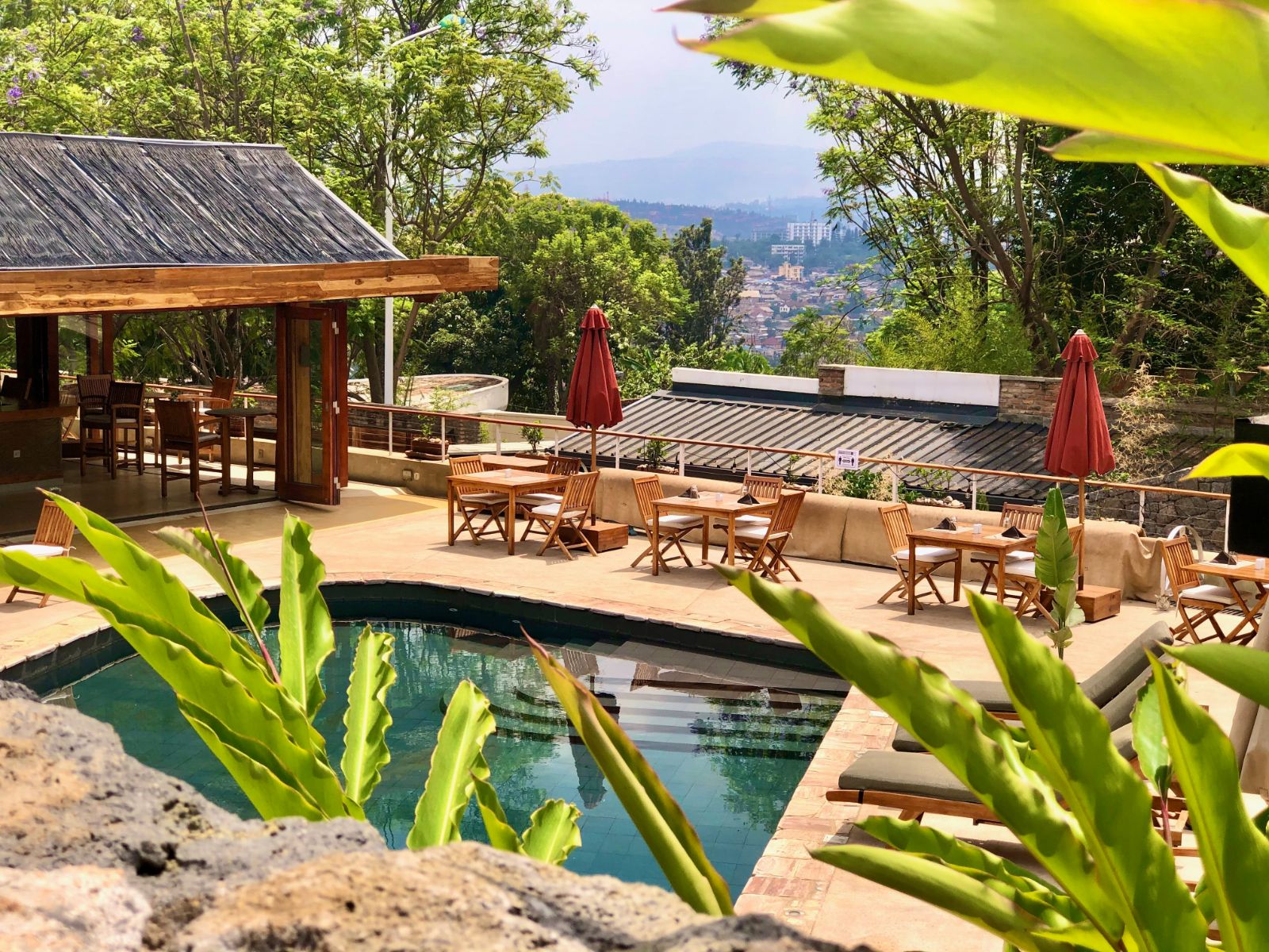 Poolside restaurant seating at The Retreat in Kigali, Rwanda