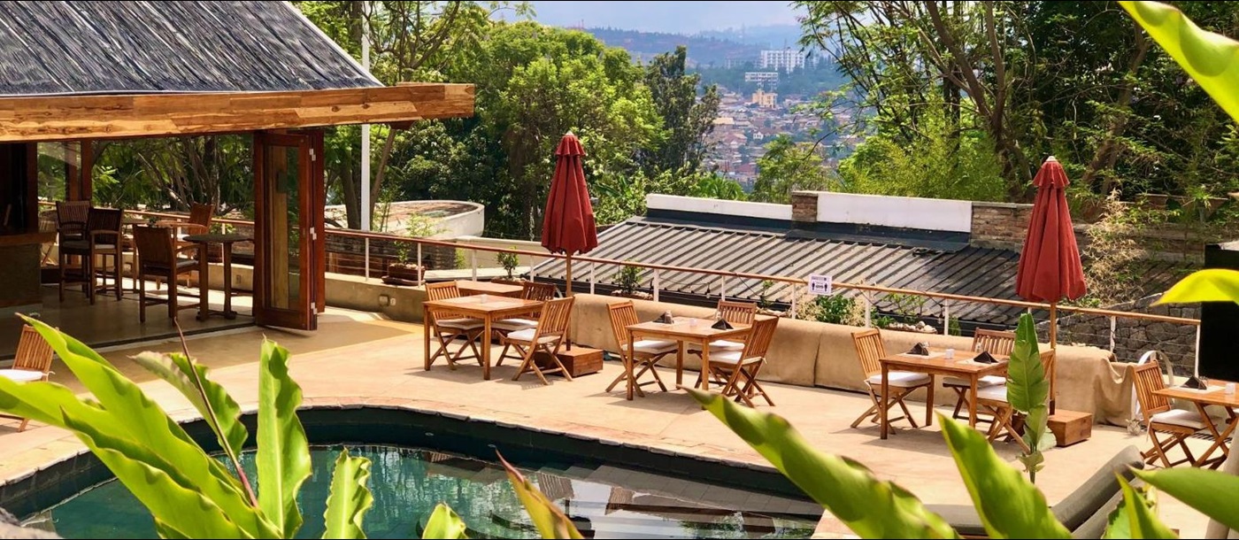 Poolside restaurant seating at The Retreat in Kigali, Rwanda