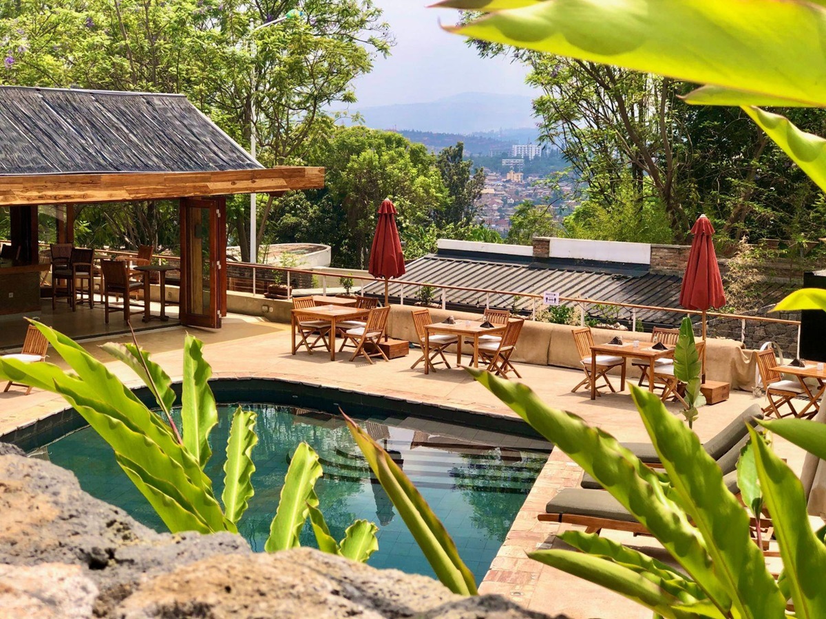Poolside restaurant seating at The Retreat in Kigali, Rwanda